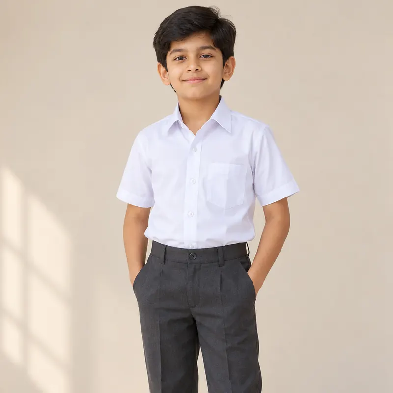 Illustration of a boy in a summer school uniform: a white half-sleeve shirt and grey trousers